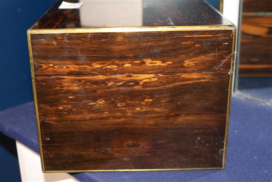 A Victorian brass mounted coromandel wood travelling toilet box with ten silver mounted toilet jars